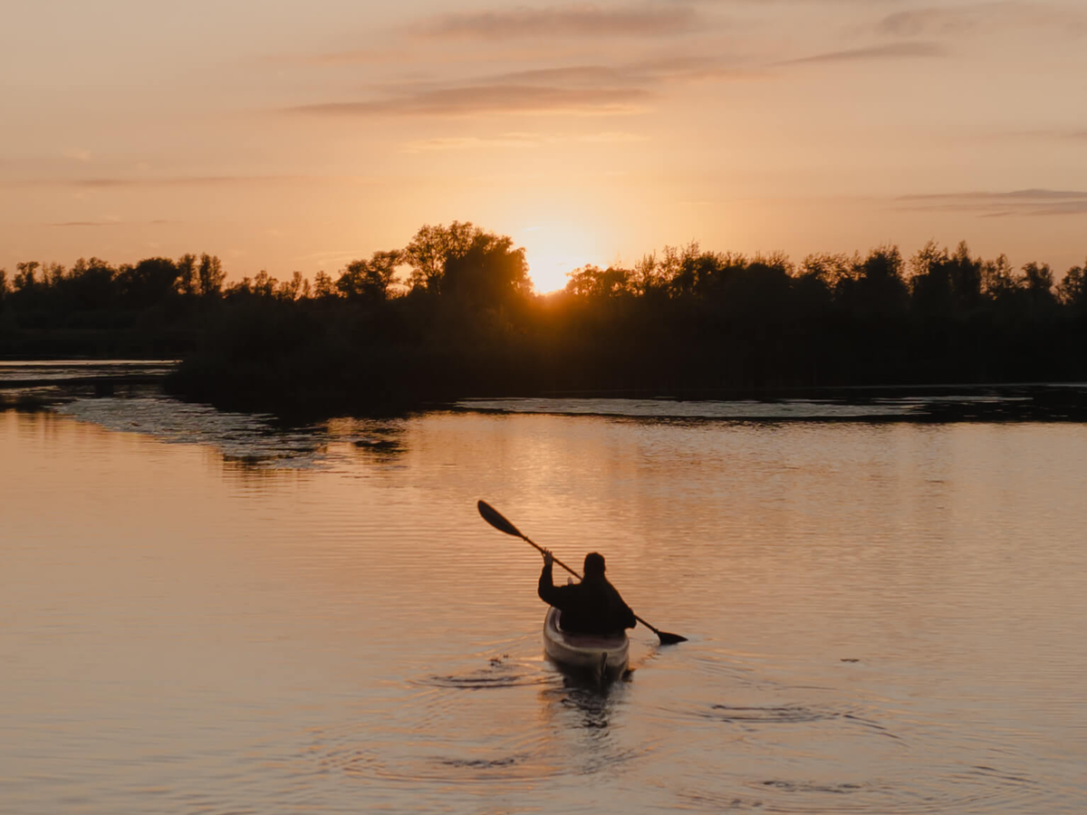 Kayaking into the sunset | Daymaker